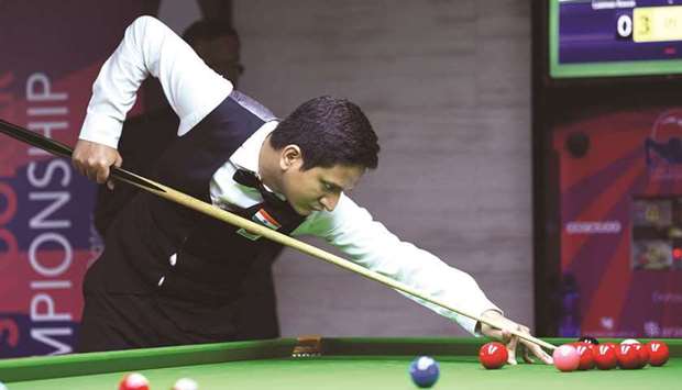 Indiau2019s Laxman Rawat in action during the the Asian Snooker Championship at Al Messila Resort yesterday. PICTURES: ACBS/Vivek Pathak