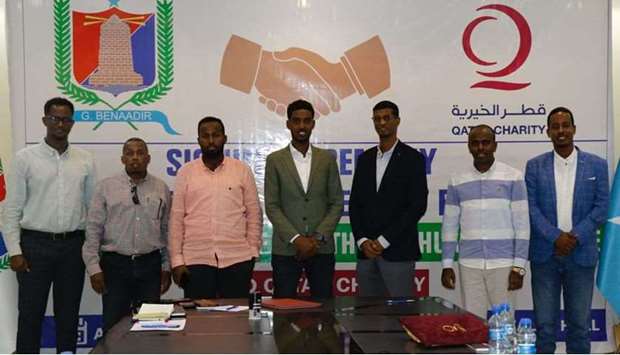 Abdinur Mursal, director of QCu2019s Somalia office; and Mohamed Mahmoud Addo, director of Health Department in Benadir Region, signed the MoU in the presence of officials from the two parties