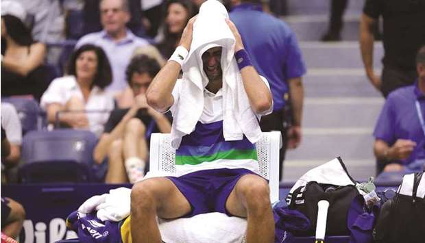 Novak Djokovic of Serbia canu2019t hold back his tears after the loss to Daniil Medvedev (not pictured) in the US Open final at the USTA Billie Jean King National Tennis Center in New York on Sunday. (AFP)