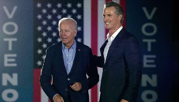 (File photo) President Joe Biden with Governor Gavin Newsom (right), who is facing a recall election. (AFP)