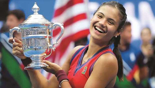 Emma Raducanu of Great Britain celebrates with the US Open trophy after winning her maiden Grand Slam title at the USTA Billie Jean King National Tennis Center in New York on September 11, 2021. (USA TODAY Sports)