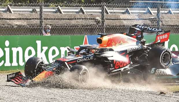 Red Bullu2019s Max Verstappen and Mercedesu2019 Lewis Hamilton crash out of the Italian Grand Prix in Monza, Italy, on September 12, 2021.