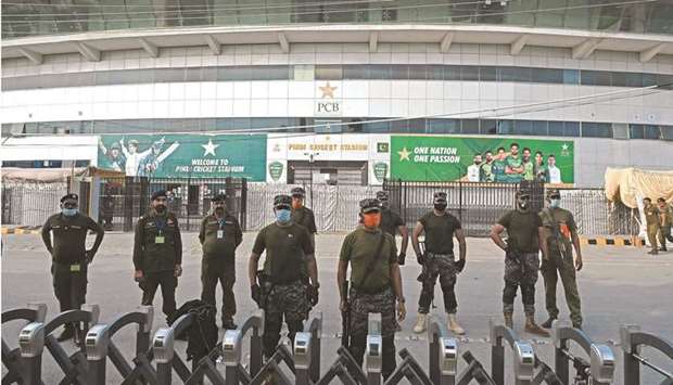 Policemen stand guard outside the Rawalpindi Cricket Stadium in Rawalpindi yesterday, after New Zealandu2019s decision to abandon a limited-overs series against Pakistan over security concerns. (AFP)