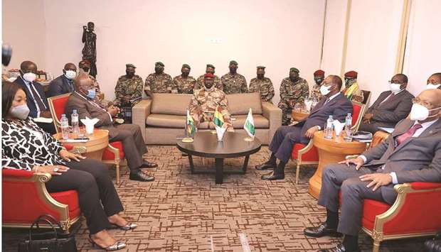 Special forces commander Mamady Doumbouya, who ousted President Alpha Conde meets Ivory Coastu2019s President Alassane Ouattara and Ghanau2019s President Nana Akufo-Addo as they arrived to discuss ways to return the country to constitutional in Conakry, Guinea, yesterday.