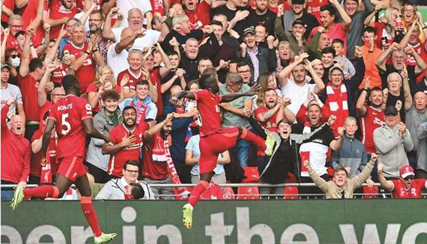 Liverpoolu2019s Sadio Mane celebrates after scoring against Crystal Palace during the Premier League. (AFP)