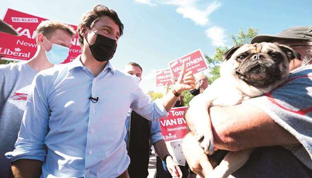 Trudeau greets supporters during a visit to a farmers market in Ontario.