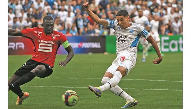Marseilleu2019s Amine Harit (right) scores against Rennais during the French Ligue 1 match yesterday. (AFP)