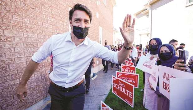 Canadau2019s Liberal Prime Minister Justin Trudeau greets supporters at an election campaign stop on the last campaign day before the election, in Vaughan, Ontario, Canada, yesterday.