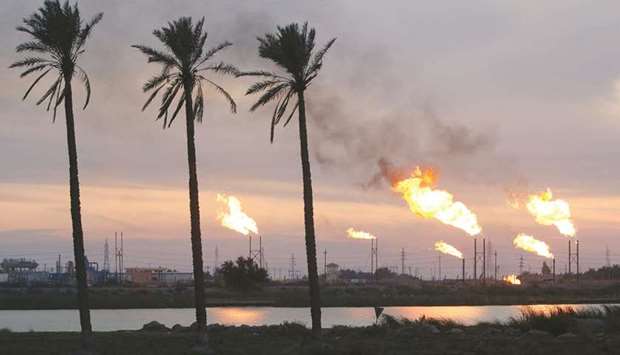 Flames emerge from flare stacks at the oil fields in Basra (file). According to the World Bank, Iraq is the second-biggest user of flaring worldwide after Russia.