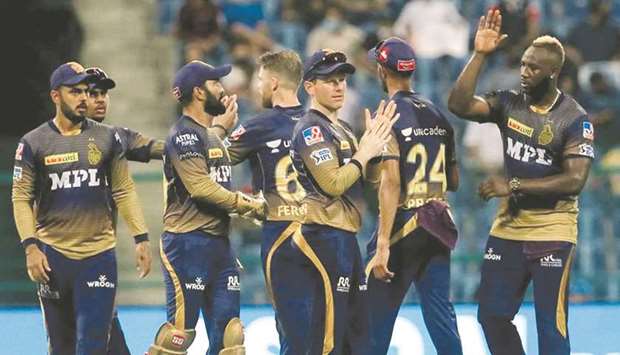 Kolkata Knight Riders players celebrates the wicket of Devdutt Padikkal (not pictured) of Royal Challengers Bangalore during their Indian Premier League match at the Sheikh Zayed Stadium in Abu Dhabi yesterday. (Sportzpics for IPL)
