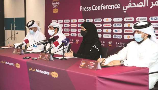 Director of Marketing & Communications Department of Qatar Football Association (QFA) Khalid al-Kuwari (second left); Director of Information Technology at the Supreme Committee for Delivery and Legacy (SC) Maryam al-Muftah (second right) and Project Manager for Al Thumama Stadium in the Supreme Committee Eng. Saud al-Ansari (right) attend a press conference yesterday.