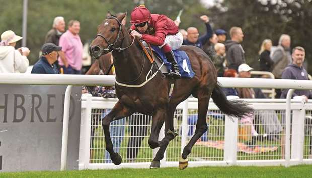 Oisin Murphy rides Outbreak to victory in the Byerley Stud Novice Stakes in Salisbury, England, on Thursday. (Francesca Altoft)