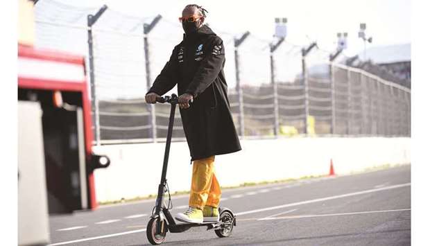 Mercedesu2019 Lewis Hamilton on a scooter at the Circuit Zandvoort in Zandvoort, Netherlands. (Reuters)