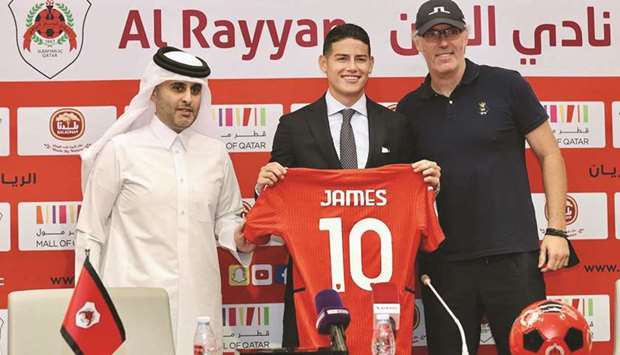 Colombiau2019s James Rodriguez (centre) poses with clubu2019s President Sheikh Ali bin Saud al-Thani and coach Laurent Blanc (right) at his unveiling at the Ahmed Bin Ali Stadium on Thursday.