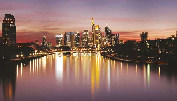 The skyline with the banking district is photographed in Frankfurt. The weaker-than-expected rebound in 2021 follows a 4.6% plunge of overall economic output in 2020 caused by coronavirus restrictions on public life and business activities to contain the spread of the highly infectious disease.