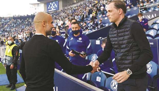 Manchester City manager Pep Guardiola (left) with Chelsea manager Thomas Tuchel. (Reuters)