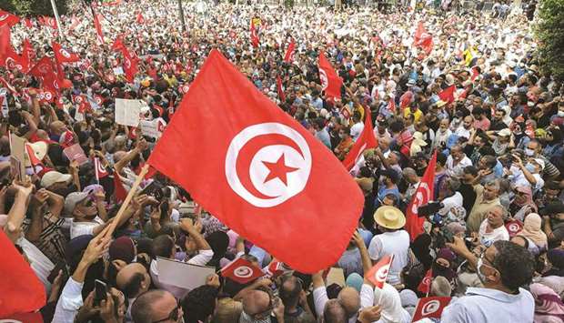Demonstrators chant slogans during a protest in Tunisiau2019s capital Tunis yesterday.