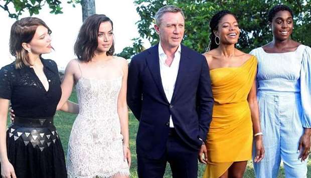 Actors Lea Seydoux, Ana de Armas, Daniel Craig, Naomie Harris and Lashana Lynch pose for a picture during a photocall for the British spy franchise's 25th film set for release next year, titled ,Bond 25, in Oracabessa, Jamaica April 25, 2019. REUTERS
