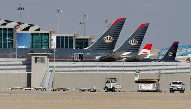 Planes that belong to the Royal Jordanian Airlines and other companies are parked at the Queen Alia International Airport in Amman, Jordan February 23, 2020. Royal Jordanian operated daily scheduled flights between Amman and both Damascus, and Aleppo. The flag carrier airline was one of the last to withdraw, in mid-2012.