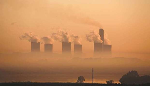 Steam rises from the Lethabo Power Station, a coal-fired power station owned by state power utility Eskom near Sasolburg, South Africa (file). Africau2019s most industrialised nation uses coal for more than 80% of its power, making it one of the worldu2019s top 20 carbon dioxide emitters u2013 but even so it regularly rolls out power cuts to protect the struggling national grid from collapse.