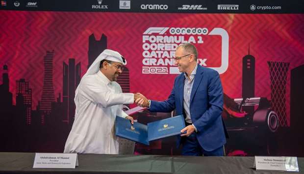 Qatar Motor & Motorcycle Federation president Abdulrahman al-Mannai (left) and Formula One president and CEO Stefano Domenicali at a press conference at the Losail International Circuit.