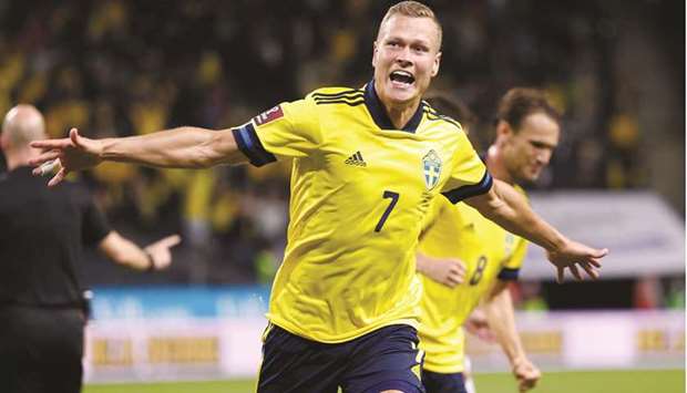 Swedenu2019s Viktor Claesson celebrates scoring his goal during the FIFA World Cup Qatar 2022 European Qualifiers match against Spain at Friends Arena in Solna, Sweden, on Thursday. (Reuters)