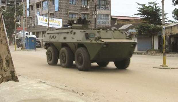 An army vehicle is seen at Kaloum neighbourhood during an uprising by special forces in Conakry, Guinea yesterday.