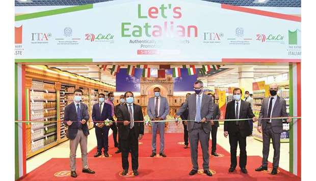 Italian ambassador Alessandro Prunas leads the inauguration of 'Let's Eatalian' yesterday at LuLu Hypermarket Al Messila branch in the presence of Italian Trade Commissioner Giosafat Rigano and Dr Mohamed Althaf, director of Lulu Group International, as well as officials from the ITA, Italian embassy, LuLu Hypermarket, and other dignitaries. PICTURE: Feroz Ahamed.