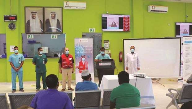 QRCS health educators visited four workers' health centers over three days and organised lectures on the Covid-19 vaccine.