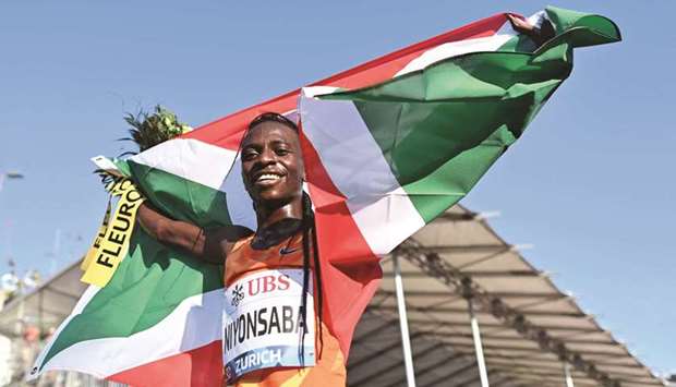 Burundiu2019s Francine Niyonsaba celebrates winning the womenu2019s 5,000m at the Diamond League athletics meeting in Zurich yesterday. (AFP)