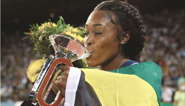 Jamaicau2019s Elaine Thompson-Herah celebrates after winning the womenu2019s 100m event of the IAAF Diamond League in Zurich yesterday. (AFP)