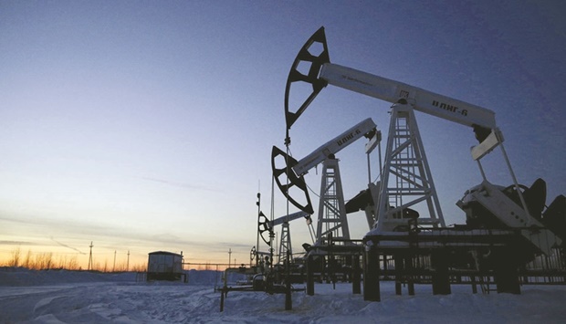 Pump jacks are seen at the Lukoil company owned Imilorskoye oil field, as the sun sets, outside the West Siberian city of Kogalym, Russia (file). India has emerged as a key buyer of Russian energy in the wake of invasion of Ukraine, scooping up millions of barrels of discounted crude shunned by Europe and the US.