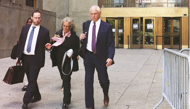 Alan Futerfas (right), a lawyer for the Trump Organisation, leaves with other lawyers after a pretrial hearing at New York State Supreme Court, yesterday.