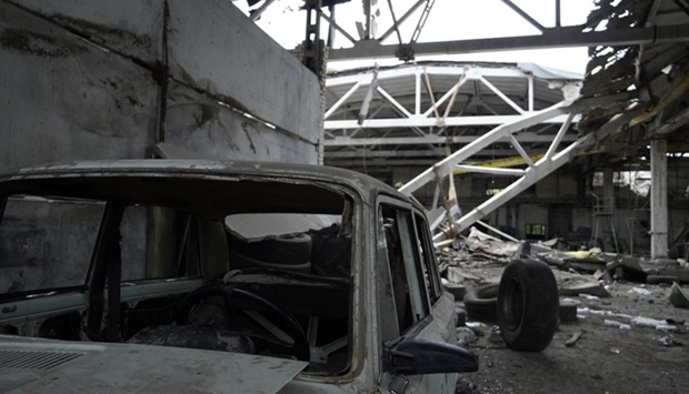 A view of a heavily damaged motor depot in the settlement of Myrne outside Melitopol in the Zaporizhzhia Oblast on September 12, amid the ongoing Russian military action in Ukraine.