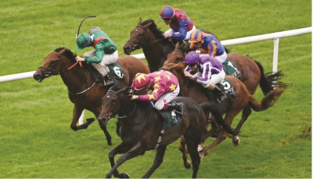 Jockey Dylan Browne McMonagle guides Al Riffa to the Goffs Vincent Ou2019Brien National Stakes (Gr.1) win at The Curragh. (Racingfotos)