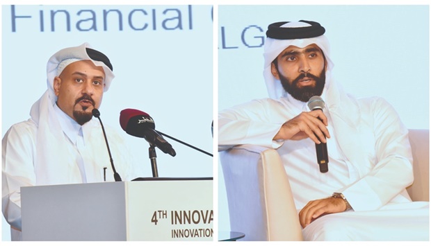 Yousuf Mohamed al-Jaida, QFC Authority CEO, left, and Abdulrahman bin Hisham al-Sowaidi, QDB chief executive officer.