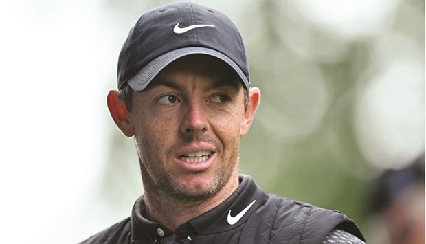 In this file photo taken on September 8, 2022 Northern Irelandu2019s Rory McIlroy smiles on the 4th tee during his opening round on day 1 of the BMW PGA Championship at Wentworth Golf Club, south-west of London. (AFP)