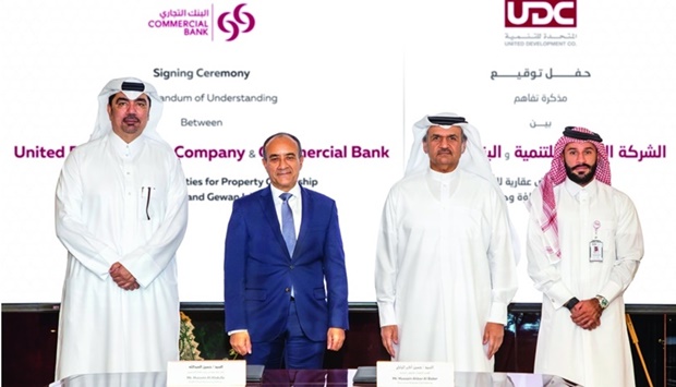 From left: Hussein al-Abdulla, Commercial Bank EGM, chief marketing officer and head of Premium Banking; Joseph Abraham, Group CEO of Commercial Bank; Ibrahim Jassim al-Othman, UDC CEO and president and member of the board; and Hussain Akbar al-Baker, UDC executive director Commercial, during the signing ceremony held at UDC Tower in The Pearl Island.