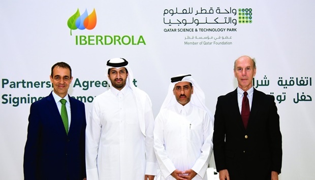 Yosouf al-Salehi, QSTP executive director, and Santiago Banales, managing director of Iberdrola Innovation Middle East, are joined by Sheikh Ali Alwaleed al-Thani, CEO of Investment Promotion Agency Qatar (IPA Qatar), and Spanish ambassador Javier Carbajosa Sanchez during the signing ceremony.