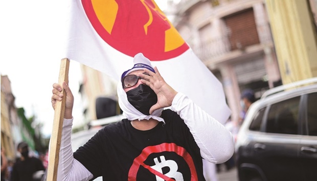 A protester wears u2018no to Bitcoinu2019 T-shirt during a protest against El Salvadoru2019s President Nayib Bukele in San Salvador, El Salvador, last week. (Reuters)