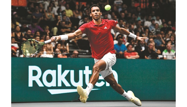 Canadau2019s Felix Auger Aliassime in action during the Davis Cup Group B match against Serbiau2019s Miomir Kecmanovic in Valencia, Spain, yesterday. (Reuters)