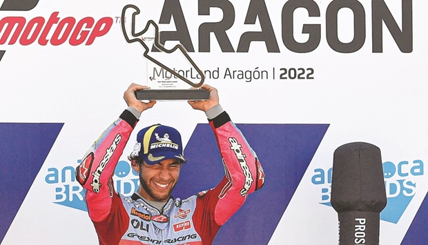 Ducati Gresini Italian rider Enea Bastianini holds the trophy after winning the Aragon MotoGP Grand Prix at the Motorland circuit in Alcaniz yesterday. (AFP)