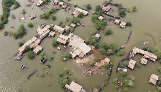 This aerial view shows a flooded residential area in Dera Allah Yar town after heavy monsoon rains in Jaffarabad district, Balochistan province, last month. Monsoon rains have submerged a third of the country and claimed more than 1,500 lives. (AFP)