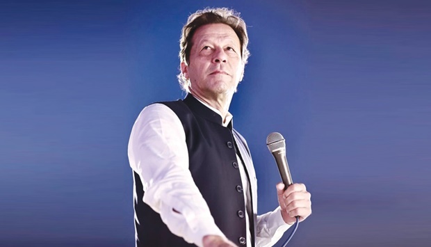 Imran Khan addressing a public rally in Charsadda, about 29km from Peshawar in the Khyber-Pakhtunkhwa province, yesterday. The public meeting was part of a sweeping political campaign the former prime minister has launched to force the government to hold swift general elections.