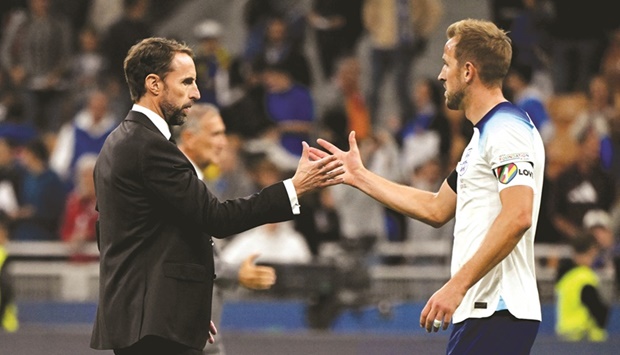 England manager Gareth Southgate shakes hands with Harry Kane after their loss to Italy in the UEFA Nations League at the San Siro in Milan on Friday. (Reuters)