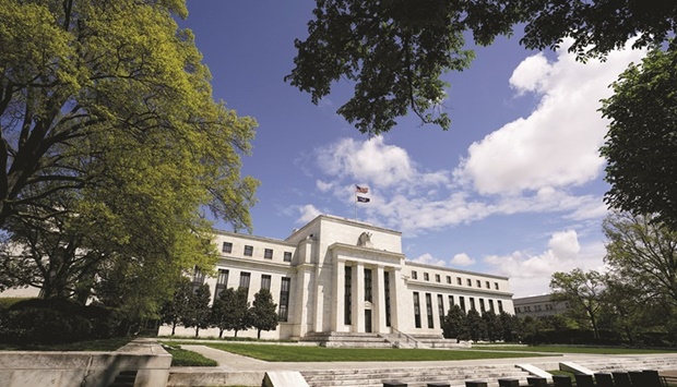 The Federal Reserve building in Washington. Market conditions are proving toxic for gold prices, Emirates NBD said and noted the Federal Reserve rate hike and dollar surge are headwinds for the precious metal.