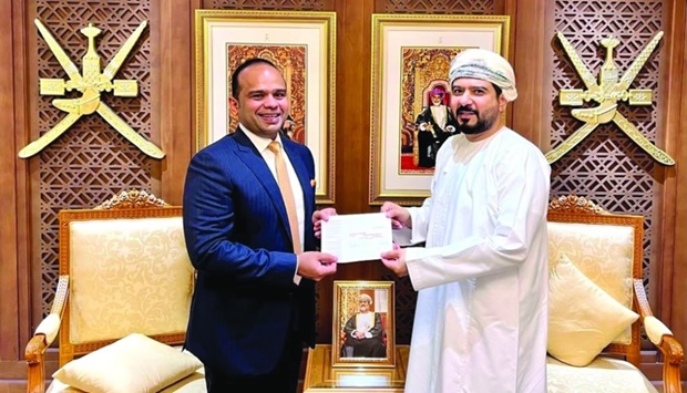 Adeeb Ahamed received the investor residency card from Qais Mohamed Moosa al-Yousef, Minister of Commerce, Industry & Investment Promotion, Government of Oman.