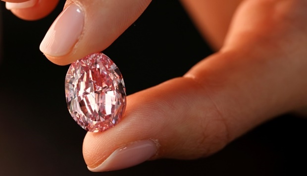 At over 18 carats, the vividly coloured gem is the largest pear-shaped pink diamond of its quality ever to be offered for sale at auction, the Christie's auction house said.