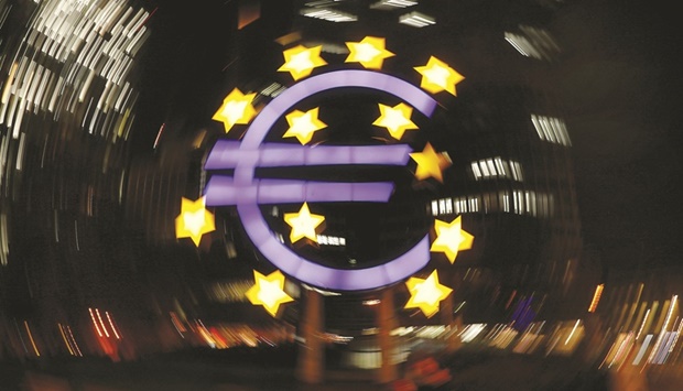 The euro sign is photographed in front of the former headquarters of the European Central Bank in Frankfurt, Germany. (Reuters)