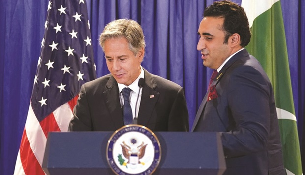 US Secretary of State Antony Blinken (left) and Pakistanu2019s Foreign Minister Bilawal Bhutto-Zardari trade places to deliver remarks after their meeting at the State Department in Washington, DC. (AFP)